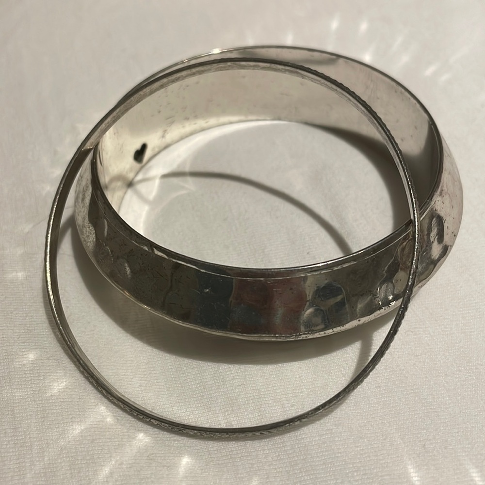 Pair of silver bangles